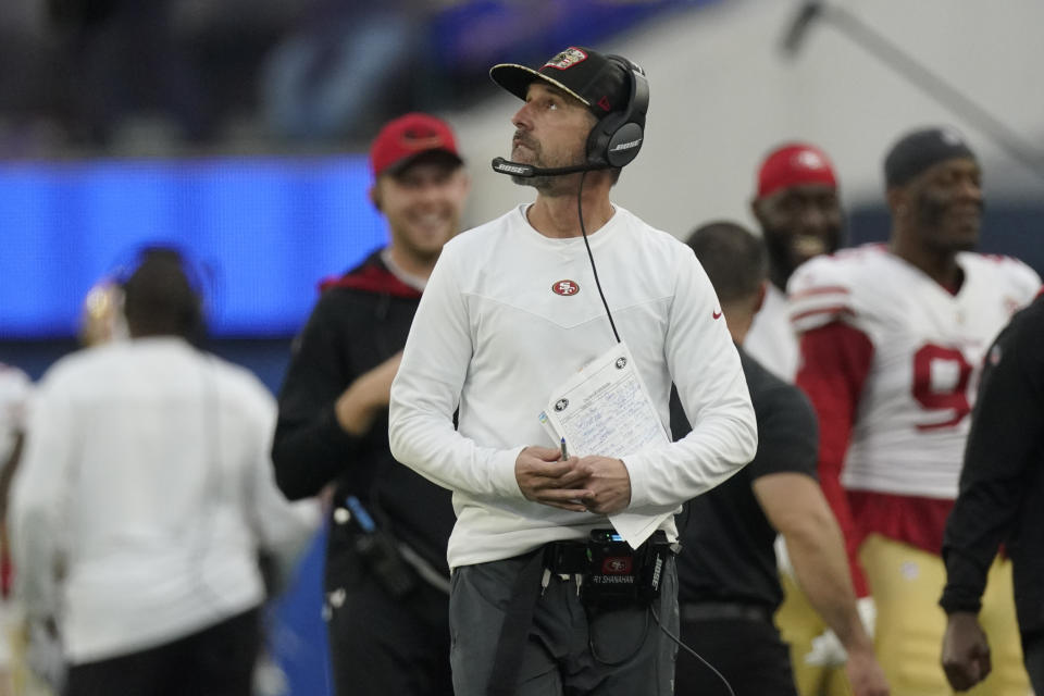 San Francisco 49ers head coach Kyle Shanahan watches a replay during the second half of an NFL football game against the Los Angeles Rams, Sunday, Jan. 9, 2022, in Inglewood, Calif. (AP Photo/Mark J. Terrill)