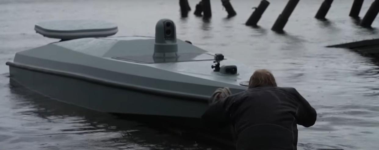 a person sitting on a boat