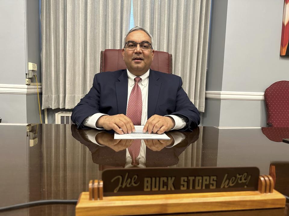Missouri Treasurer Vivek Malek speaks about a program that uses state funds to back low-interest loans during an interview on Jan. 4, 2024, at his state Capitol office in Jefferson City, Missouri. Participation in such programs has grown after the Federal Reserve approved a series of key interest rate hikes. (AP Photo/David A. Lieb)