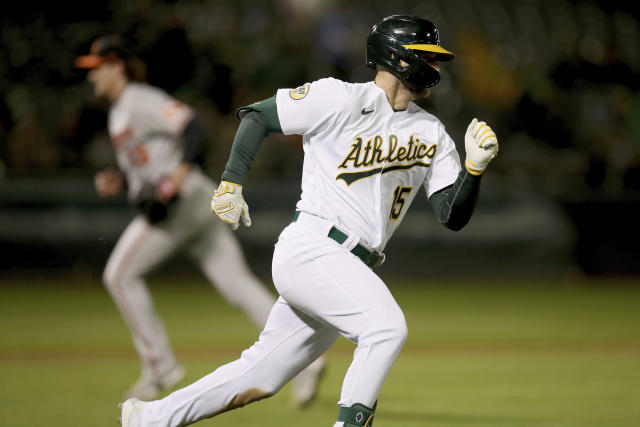 A's edge Giants before biggest home crowd of the season