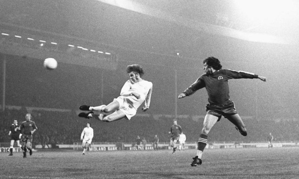 Denmark’s Henning Jensen scores for the Three from Bobby Charlton’s cross.