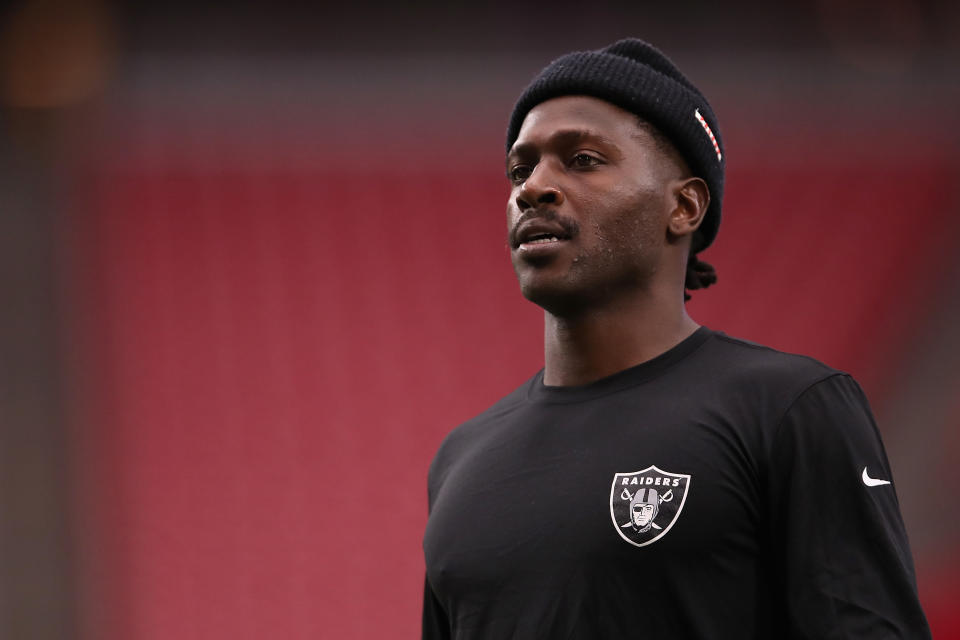 GLENDALE, ARIZONA - AUGUST 15:  Wide receiver Antonio Brown #84 of the Oakland Raiders warms up before the NFL preseason game against the Arizona Cardinals at State Farm Stadium on August 15, 2019 in Glendale, Arizona. (Photo by Christian Petersen/Getty Images)