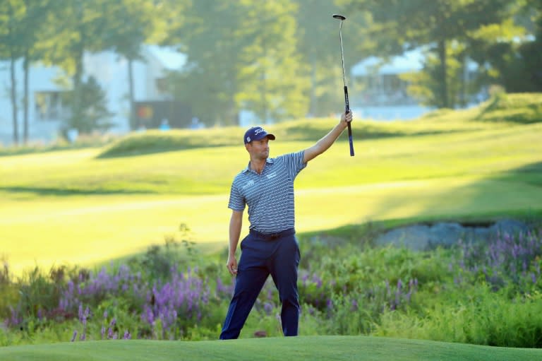 Webb Simpson rolled in an eagle from 70 feet to complete a bogey-free eight-under par 63 to stand on 11-under 131 after 36 holes at the PGA Dell Technologies Championship