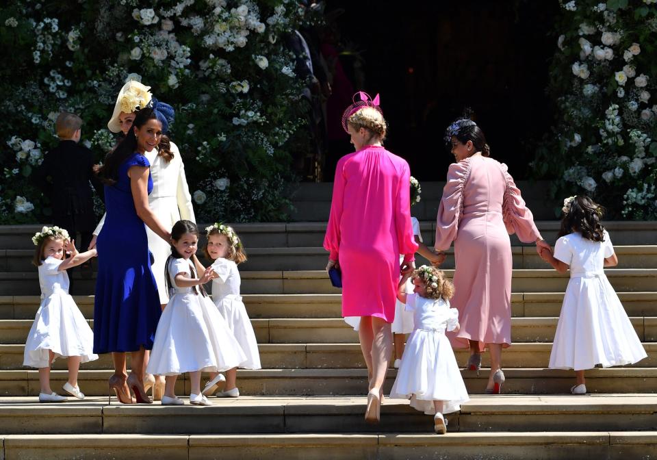 Princess Charlotte of Cambridge, Catherine, Duchess of Cambridge, Jessica Mulroney, Ivy Mulroney, Florence van Cutsem, Zoe Warren, Zalie Warren, Benita Litt, Remy Litt and Rylan Litt arrive for the wedding ceremony of Prince Harry and US actress Meghan Markle at St George's Chapel, Windsor Castle on May 19, 2018 in Windsor, England