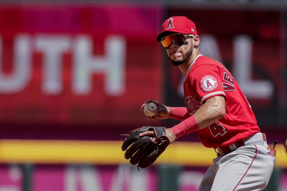 Los Angeles Angels shortstop Andrew Velazquez throws to first for the out on Atlanta Braves' Dansby Swanson during the fifth inning of a baseball game Sunday, July 24, 2022, in Atlanta. (AP Photo/Butch Dill)