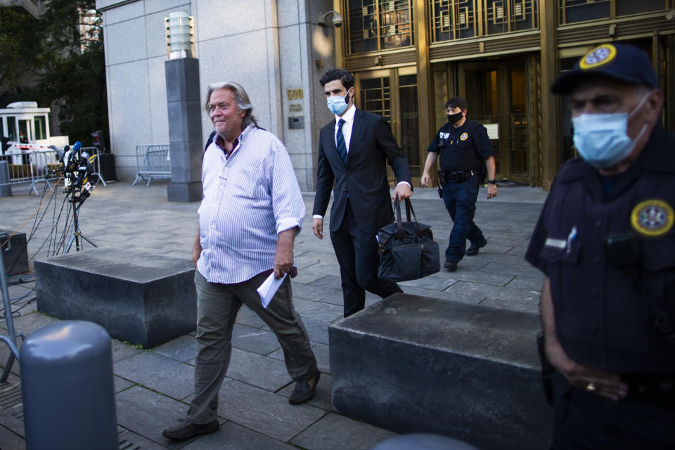 President Donald Trump's former chief strategist Steve Bannon exits court after pleading not guilty to charges that he ripped off donors to an online fundraising scheme to build a southern border wall, Thursday, Aug. 20, 2020, in New York. (AP Photo/Eduardo Munoz Alvarez)