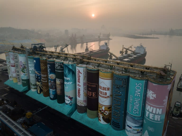 Twenty-two artists used more than 850,000 litres of paint to tell the story, which reflects the seasons and resembles 16 individual book covers