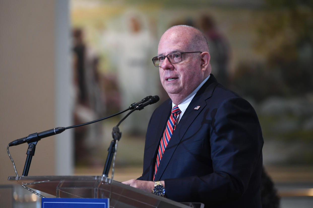 Maryland Gov. Larry Hogan at the microphone.