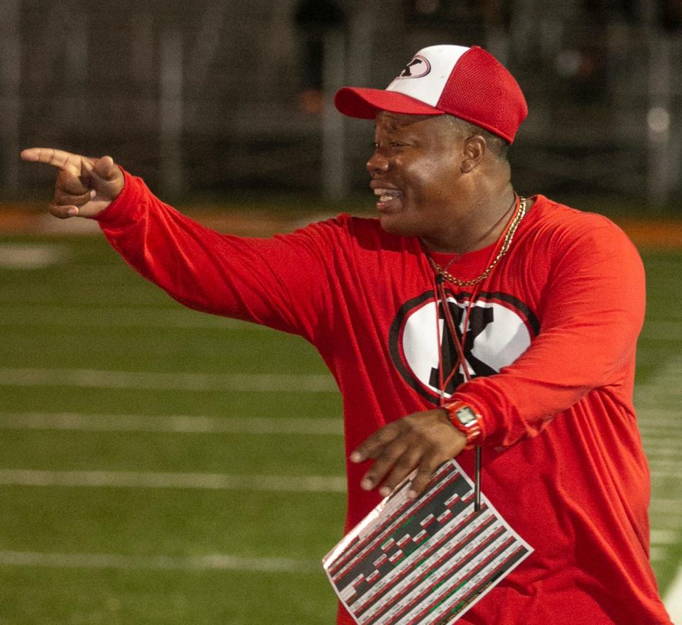 Kathleen High School Head Football Coach Kenneth Strong instructs his players against Lakeland High School during the first half at Bryant Stadium in Lakeland Friday night. October 29, 2021. MICHAEL WILSON | LEDGER CORRESPONDENT