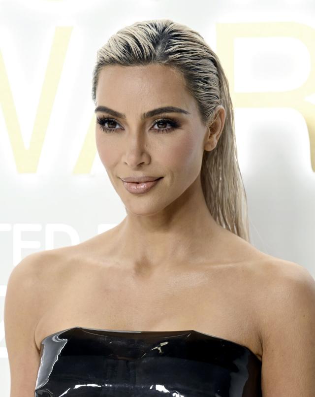 Kim Kardashian demonstrates DIY boob lift after incredibly painful