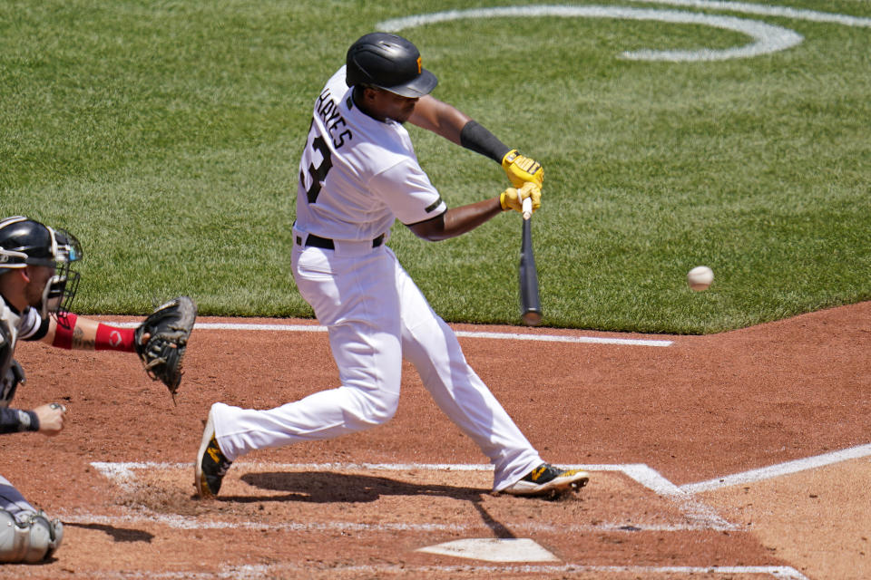 Pittsburgh Pirates' Ke'Bryan Hayes singles off Chicago White Sox starting pitcher Dylan Cease, driving in a run during the third inning of a baseball game in Pittsburgh, Wednesday, June 23, 2021. (AP Photo/Gene J. Puskar)