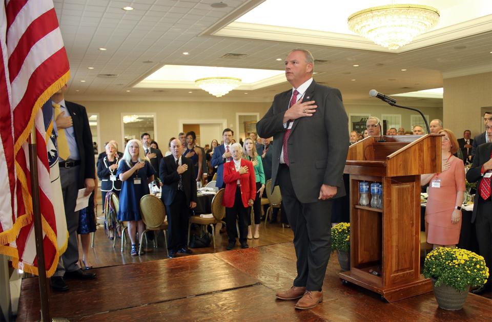 Chad Hawkins leads the Pledge of Allegiance during the Gaston County Republican Party’s 2021 Lincoln Day Dinner on Sept. 25, 2021, at the Gaston Country Club. Hawkins won the GOP nomination for sheriff in Tuesday's primary election, and with no opposition in November appears headed to be Gaston County's first Republican sheriff in decades.