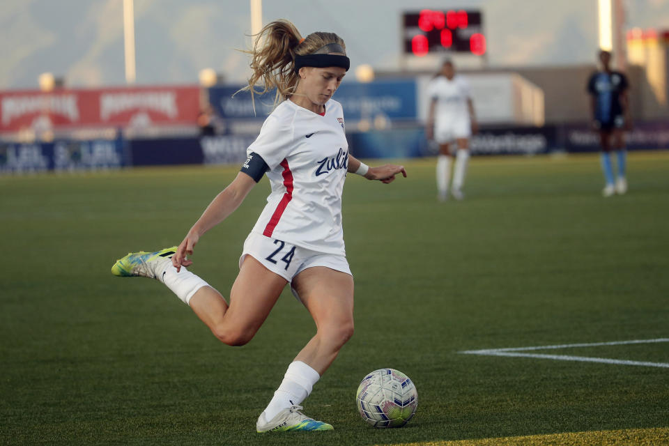 OL Reign forward Bethany Balcer (24) takes shot during the first half of an NWSL Challenge Cup soccer match against the Sky Blue FC at Zions Bank Stadium on Tuesday, June 30, 2020, in Herriman, Utah. Balcer didn't come to the National Women's Soccer League by way of a powerhouse college program like North Carolina or UCLA. She didn't come to the league with a national team history or as a top draft pick, either. Balcer forged her own path to OL Reign. (AP Photo/Rick Bowmer)