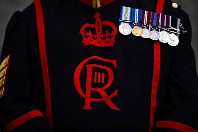 BEN STANSALL/AFP via Getty Images New cypher on uniforms at Tower of London