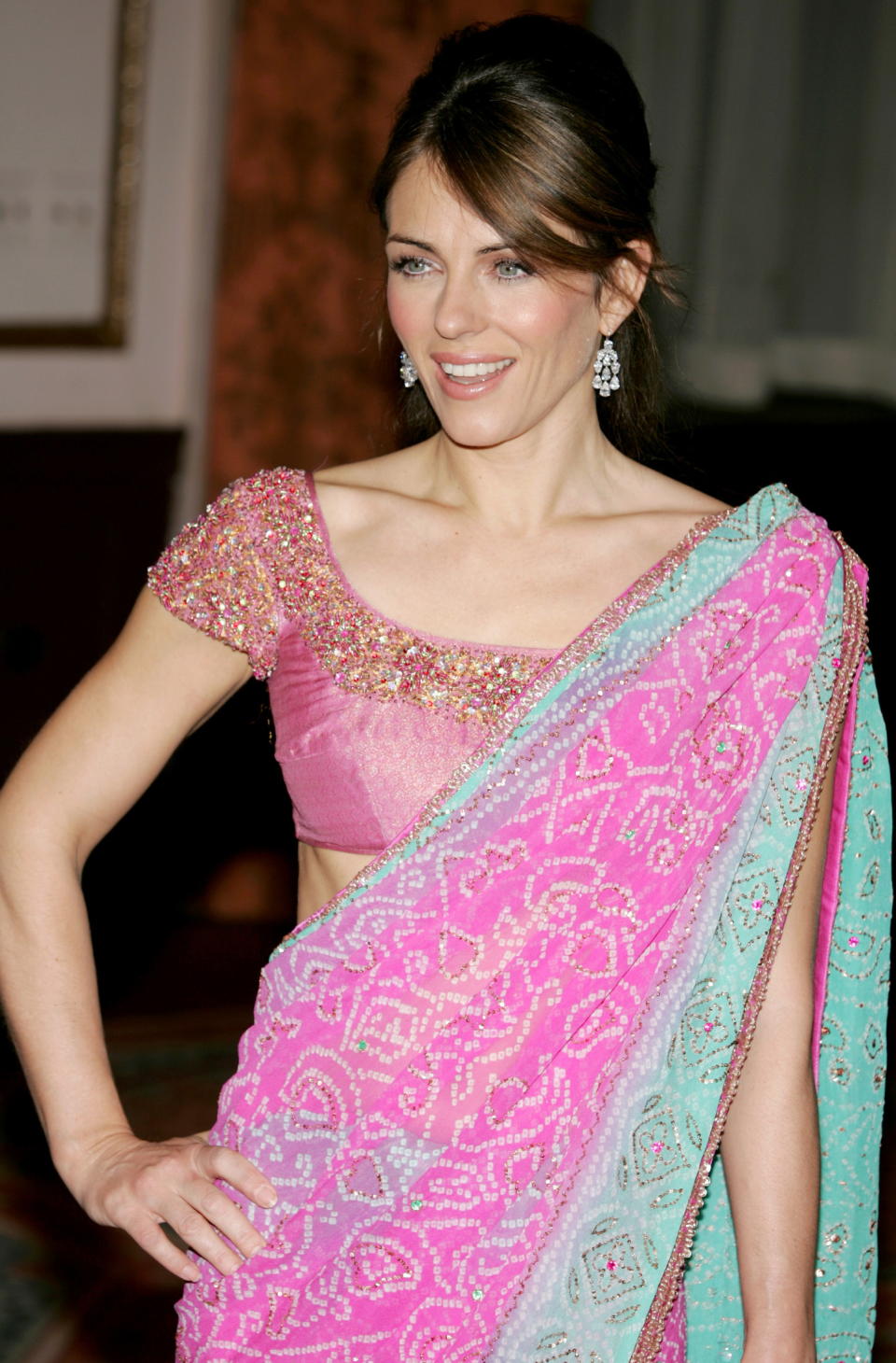 British Actress/model Elizabeth Hurley poses for the photographers as she arrives for The Breast Cancer Research Foundation's Annual Red Hot Pink Ball at The Waldorf-Astoria hotel in New York, April 20, 2005.