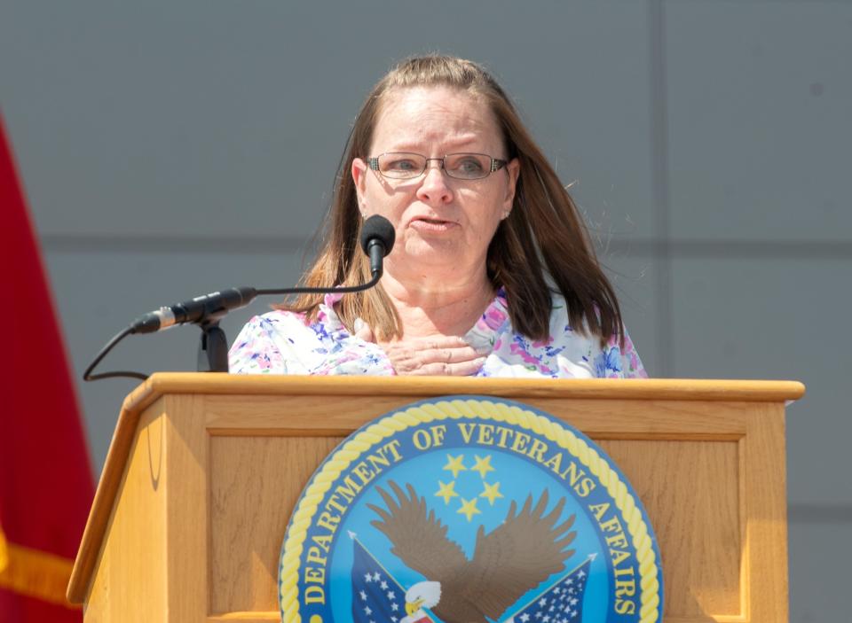 Julie Pittman speaks at a ribbon-cutting ceremony for the new VA clinic named after her father Medal of Honor recipient Richard A. Pittman in French Camp on Apr. 25, 2024.