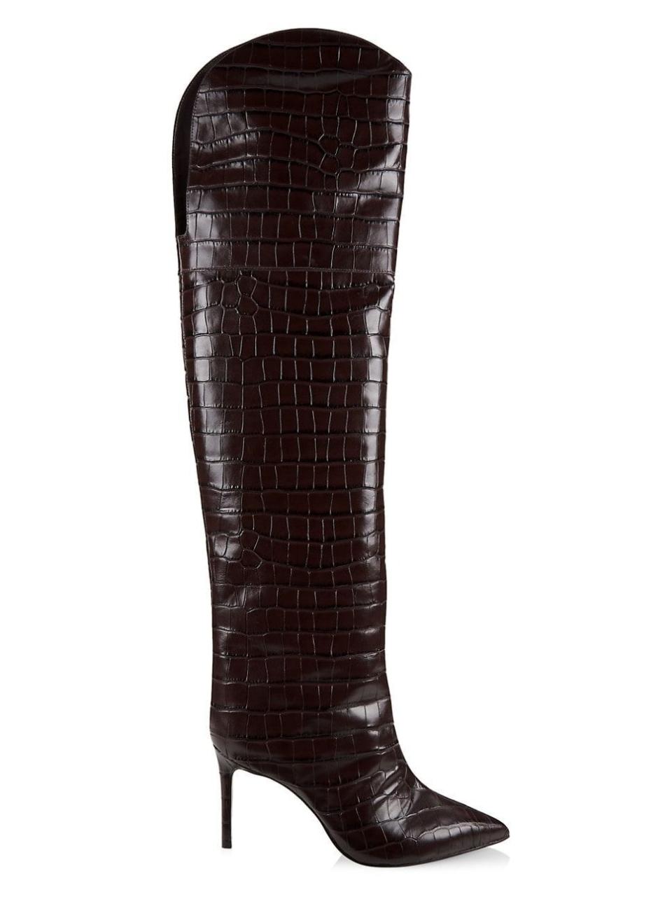 <p><a href="https://go.redirectingat.com?id=74968X1596630&url=https%3A%2F%2Fwww.saksfifthavenue.com%2Fproduct%2Fschutz-maryana-crocodile-embossed-leather-over-the-knee-boots-0400019302043.html%3Fdwvar_0400019302043_color%3DDARK%2BCHOCOLATE&sref=https%3A%2F%2F" rel="nofollow noopener" target="_blank" data-ylk="slk:Shop Now;elm:context_link;itc:0;sec:content-canvas" class="link ">Shop Now</a></p><p>Maryana Over-The-Knee Boots</p><p>Saks Fifth Avenue</p><p>$298.00</p>