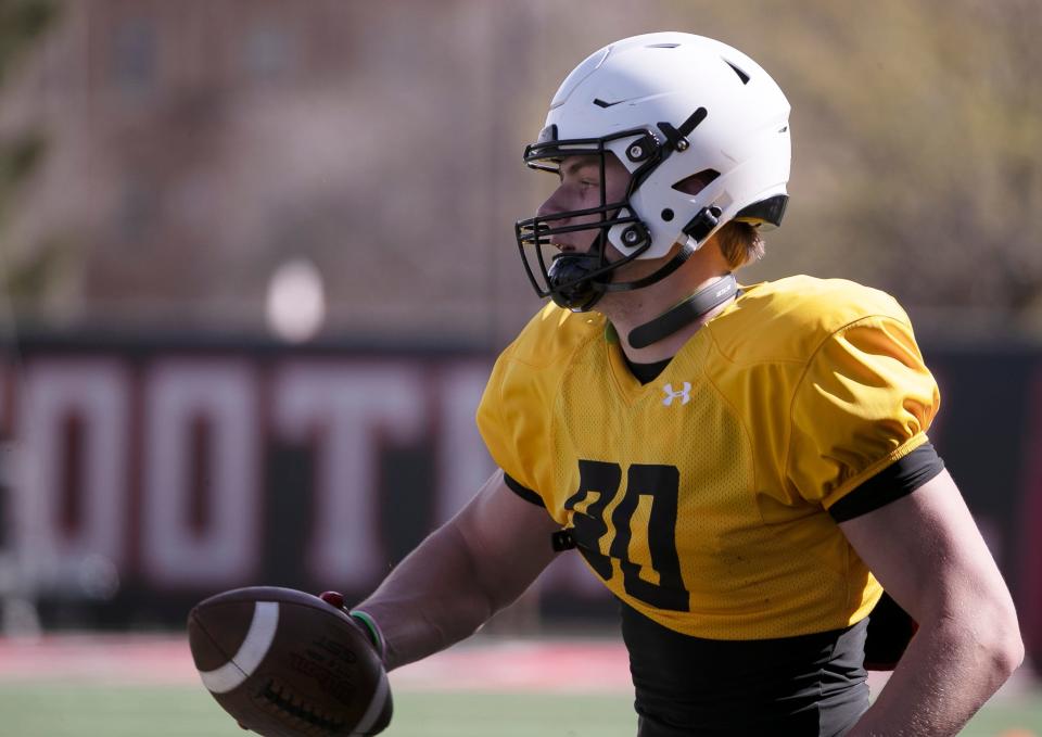 The Texas Tech staff bought tight end Mason Tharp (80) a Q-Collar, a device whose manufacturer says helps protect the brain during repetitive head impacts. Tharp missed the last three games of last season with a concussion and was a non-contact participant in spring football practice.