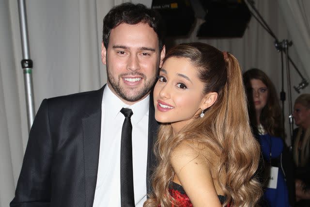 <p>Chelsea Lauren/AMA2013/Getty</p> Scooter Braun and Ariana Grande attend the 2013 American Music Awards in Los Angeles.
