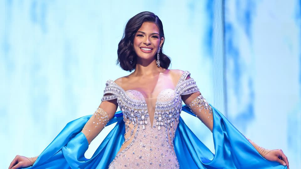 Sheynnis Palacios, Miss Nicaragua, competes in the evening gown round. Her look featured ornate beading and an extravagant floor-length cape. - Hector Vivas/Getty Images