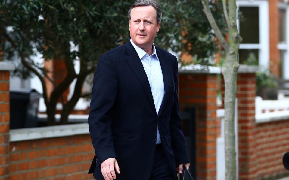 Former British Prime Minister David Cameron leaves his home, as investigations continue into the collapse of Greensill Capital and his failed attempts, as a Greensill employee, to persuade the British Treasury and the Bank of England to include the firm in the UK's COVID rescue programmes, in London, Britain, May 12, 2021. REUTERS/Hannah McKay - HANNAH MCKAY/REUTERS