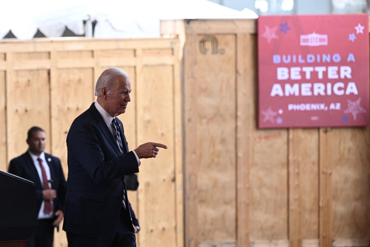 US President Joe Biden greets attendees after delivering remarks on his economic plan at TSMC Semiconductor Manufacturing Facility in Phoenix, Arizona, on December 6, 2022. (Photo by Brendan SMIALOWSKI / AFP) (Photo by BRENDAN SMIALOWSKI/AFP via Getty Images)