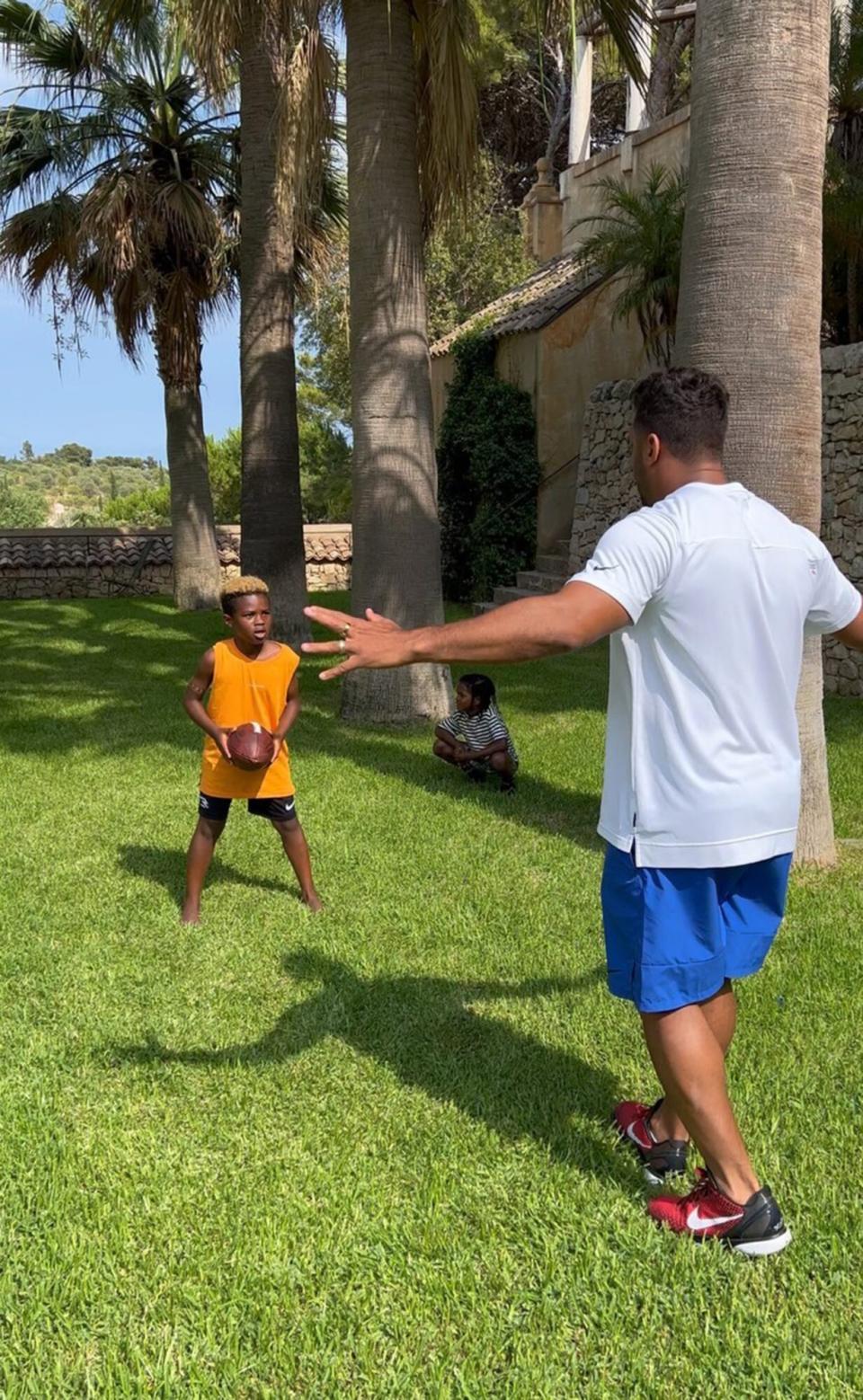 Russell Wilson Runs Football Drill with Son Future and Friend: ‘Young Legends’