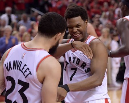May 25, 2019; Toronto, Ontario, CAN; Toronto Raptors guards Kyle Lowry (7) and Fred VanVleet (23) react as the Raptors win over Milwaukee Bucks in game six of the Eastern Conference final at Scotiabank Arena to advance to the NBA Final. Dan Hamilton-USA TODAY Sports
