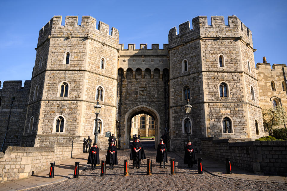 WINDSOR, UNITED KINGDOM - APRIL 13: Stewards are seen outside a gate to Windsor Castle as tributes continue to be made to Prince Philip, Duke Of Edinburgh who died at age 99 on April 13, 2021 in Windsor, United Kingdom. The Queen announced the death of her beloved husband, His Royal Highness Prince Philip, Duke of Edinburgh. HRH passed away peacefully April 9th at Windsor Castle. (Photo by Leon Neal/Getty Images)