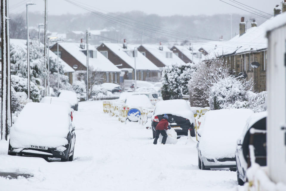  A child rolls a snowball in the West Yorkshire village of Honley. Heavy snow fell overnight in West Yorkshire, causing dangerous driving conditions. (Photo by Adam Vaughan / SOPA Images/Sipa USA) 