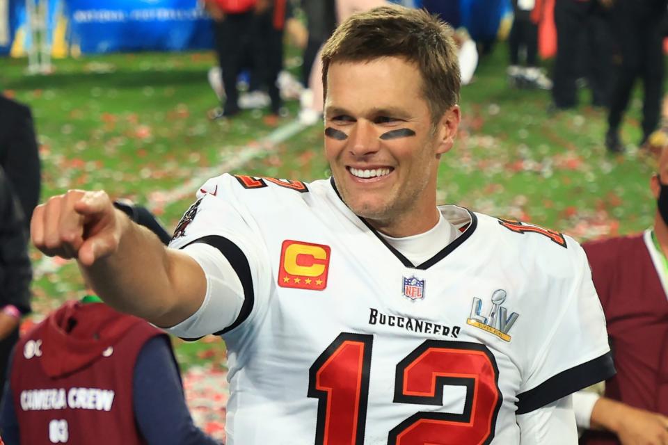 TAMPA, FLORIDA - FEBRUARY 07: Tom Brady #12 of the Tampa Bay Buccaneers celebrates after defeating the Kansas City Chiefs in Super Bowl LV at Raymond James Stadium on February 07, 2021 in Tampa, Florida. The Buccaneers defeated the Chiefs 31-9. (Photo by Mike Ehrmann/Getty Images)