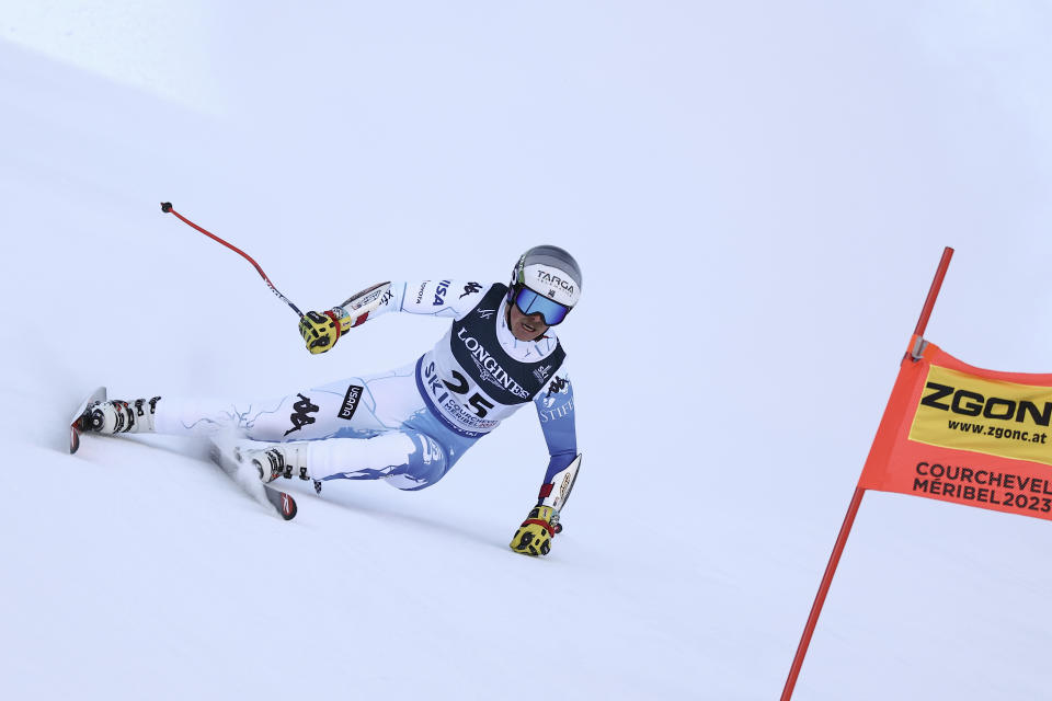 United States' River Radamus speeds down the course during the super G portion of an alpine ski, men's World Championship combined race, in Courchevel, France, Tuesday, Feb. 7, 2023. (AP Photo/Gabriele Facciotti)