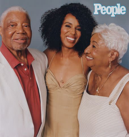 <p>Josefina Santos</p> Kerry Washington with her mom, Valerie, and dad, Earl