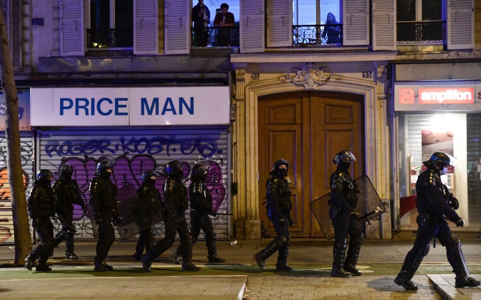 Riot police were called out to tackle an anti-curfew protest - Julien Mattia/Anadolu Agency via Getty Images