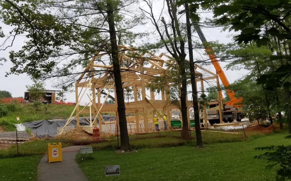 Modern equipment, including a crane, is being used to enhance history at Renfrew Museum and Park with a 50- by 50-foot replica of an early 1800s gristmill.