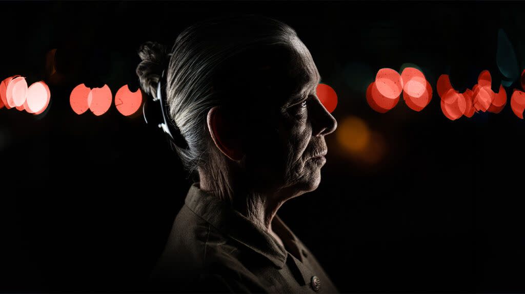 An Old Woman With White Hair In The Dark From The Profile