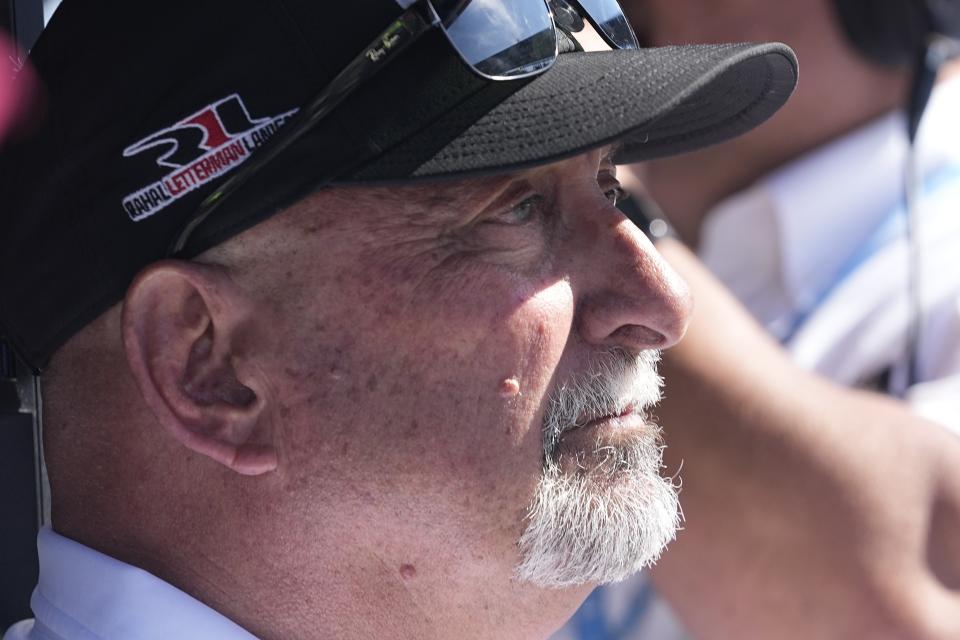 Bobby Rahal watches as Jack Harvey, of England, runs during qualifications for the Indianapolis 500 auto race at Indianapolis Motor Speedway, Sunday, May 21, 2023, in Indianapolis. Harvey bumped Graham Rahal out of the race. (AP Photo/Darron Cummings)