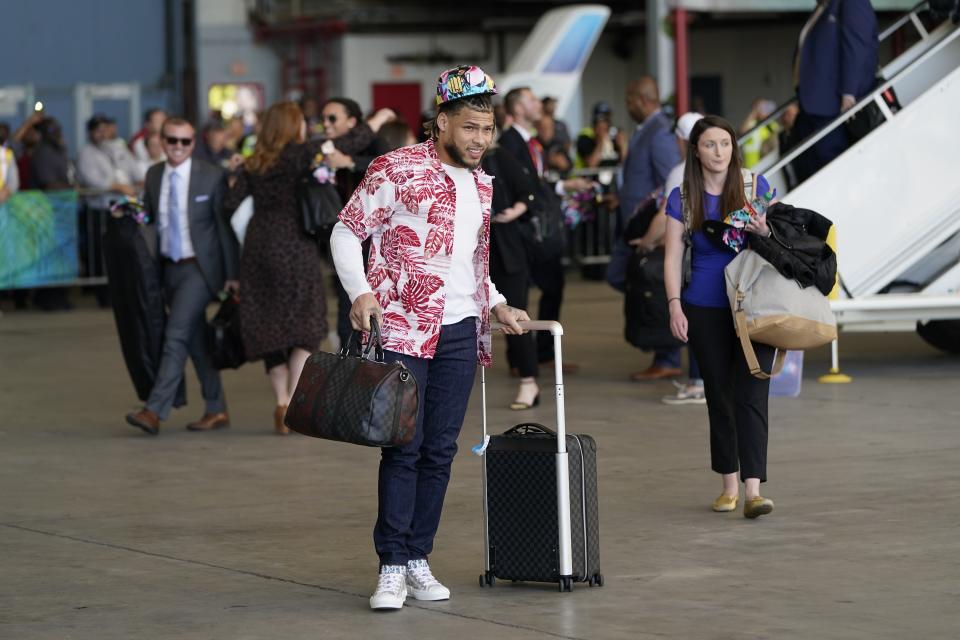 Kansas City Chiefs' Tyrann Mathieu arrives for the NFL Super Bowl 54 football game Sunday, Jan. 26, 2020, at the Miami International Airport in Miami. (AP Photo/David J. Phillip)