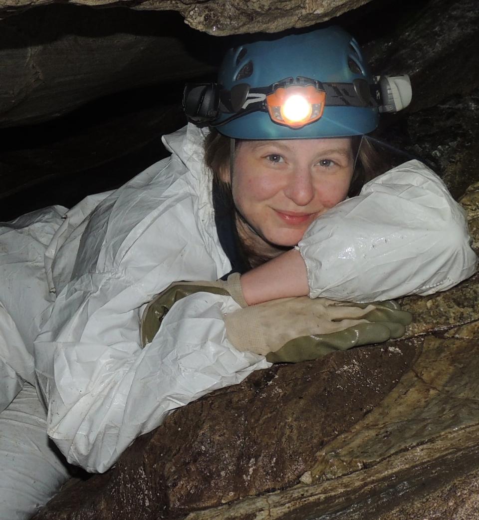 Karen Vanderwolf, seen here in New Brunswick's Harbell's Cave, runs a cross-Canada bat house project. She said there are two main species that use bat boxes in Canada — the little brown bat and the big brown bat. 