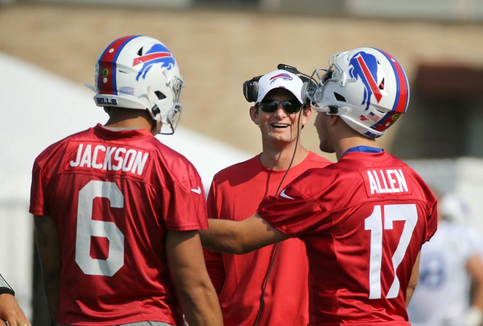 Bills quarterback's coach Ken Dorsey with Josh Allen and Tyree Jackson.