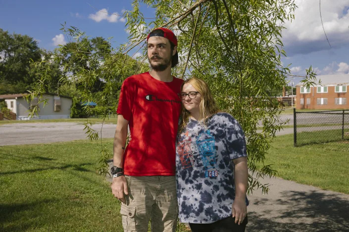 Madison Underwood and her fiance, Adam Queen, before leaving on their four-hour drive across state lines and time zones to a Georgia abortion clinic, in Pikeville, Tenn., outside Chattanooga, July 4, 2022. (Kendrick Brinson/The New York Times)