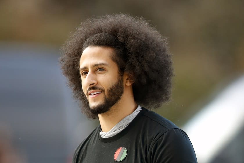 FILE - In this Nov. 16, 2019, file photo, free agent quarterback Colin Kaepernick arrives for a workout for NFL football scouts and media in Riverdale, Ga. Kaepernick's publishing company is putting out a collection of 30 essays over the next four weeks about abolition, police and prisons. The project is titled: "Abolition For the People: The Movement For A Future Without Policing & Prisons." Kaepernick envisioned and curated this project following the deaths of George Floyd and Breonna Taylor. (AP Photo/Todd Kirkland, File)