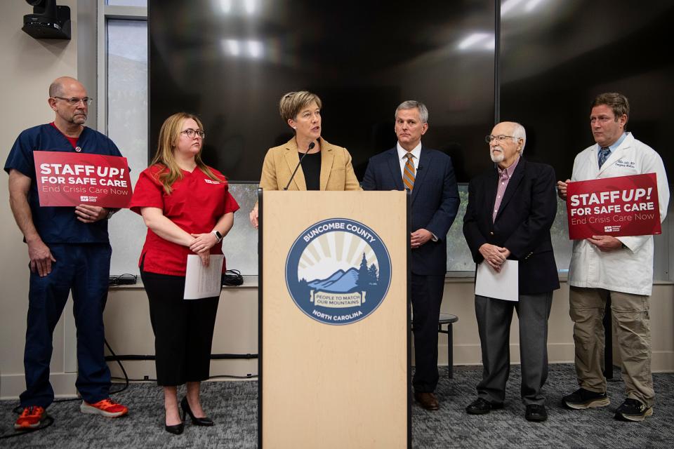 Sen. Julie Mayfield speaks during a press conference with N.C. Attorney General Josh Stein on the filing of a lawsuit against HCA, Dec. 14, 2023, in Asheville.