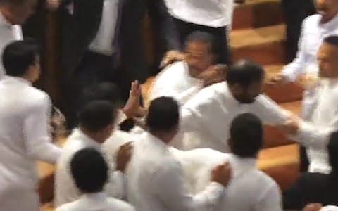 Sri Lankan MPs brawl in Parliament - Credit: Newsflare