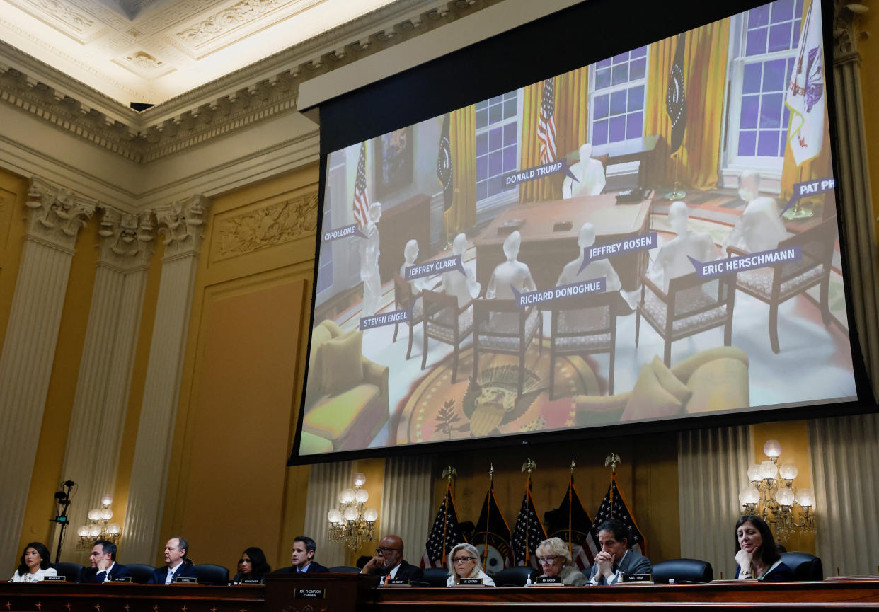 A re-creation of a meeting between then-President Donald Trump and White House lawyers and DOJ officials is shown during a January 6 committee hearing.