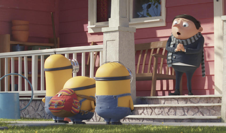 This image released by Universal Pictures shows characters, from left, Kevin, Bob, Stuart, and Gru, voiced by Steve Carell, in a scene from "Minions: The Rise of Gru." (Illumination Entertainment/Universal Pictures via AP)
