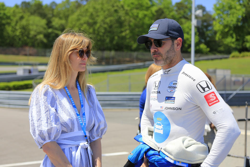 LEEDS, AL - MAY 01: Jimmie Johnson (48) the of United States and Chip Ganassi Racing talks with his wife Chandra before the running of the NTT INDYCAR SERIES Honda INDY Grand Prix of Alabama at Barber Motorsports Park on May 01, 2022 in Leeds, AL.  (Photo by David J. Griffin/Icon Sportswire via Getty Images)