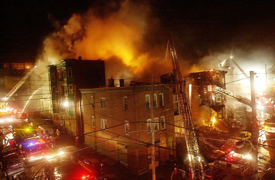 More than 175 firefighters from across the region fanned across Nodine Hill to fight the Oak Street fire, braving hills, wind, cold, wires and fire.