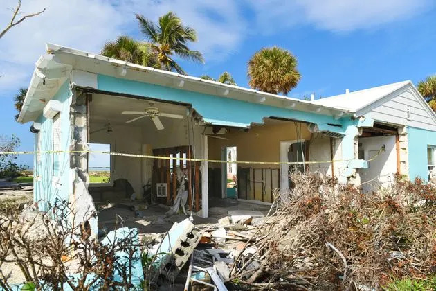 A collapsed home is seen in Naples, Florida, following Hurricane Ian in 2022. The Category 5 Atlantic hurricane was the third-costliest weather disaster on record.