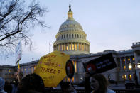 Demonstrators gather outside the U.S. Capitol to protest the Republican tax plan as it works through the Senate in Washington November 30, 2017. REUTERS/James Lawler Duggan